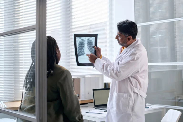 pulmonology - senior doctor checking lungs xray